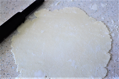 Roll Out One Half Into a Square of the Thickness of That of a Roti.