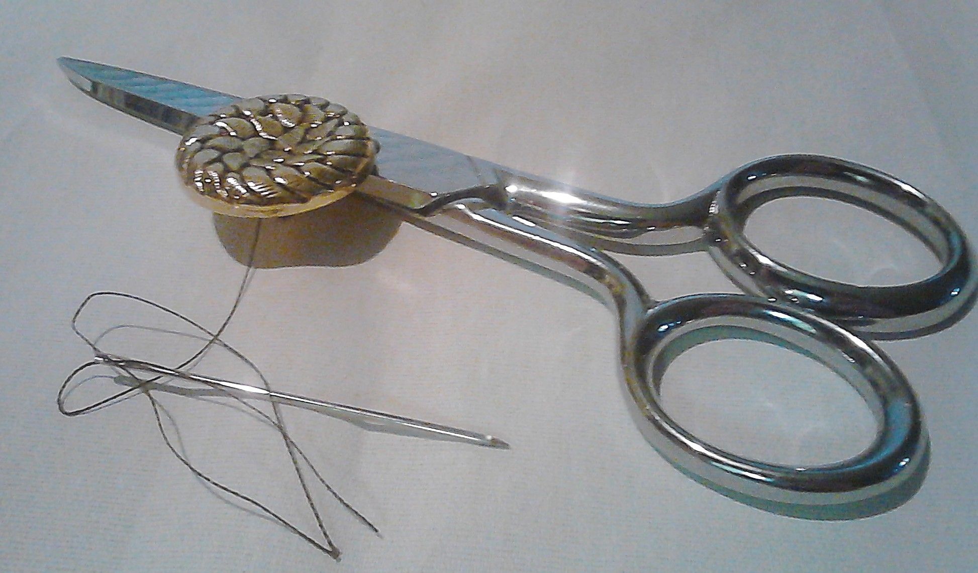 How to Professionally Sew on a Button by Hand