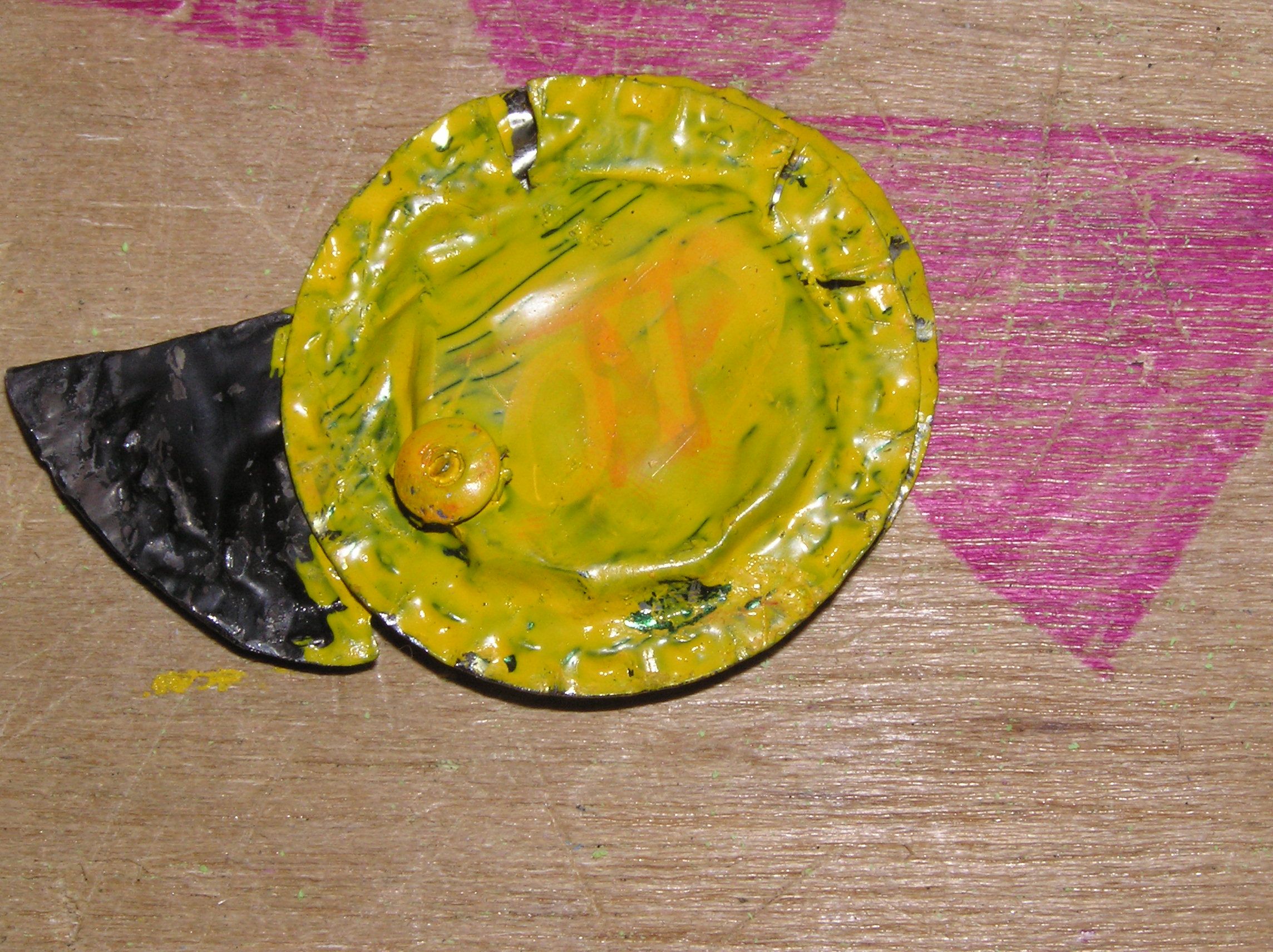 How to Make a Survival Knife From 3 Beer Caps and a Rivet.