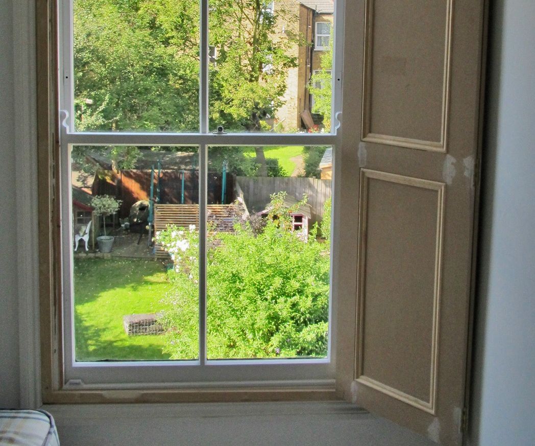 Holding concertina window shutters with magnets