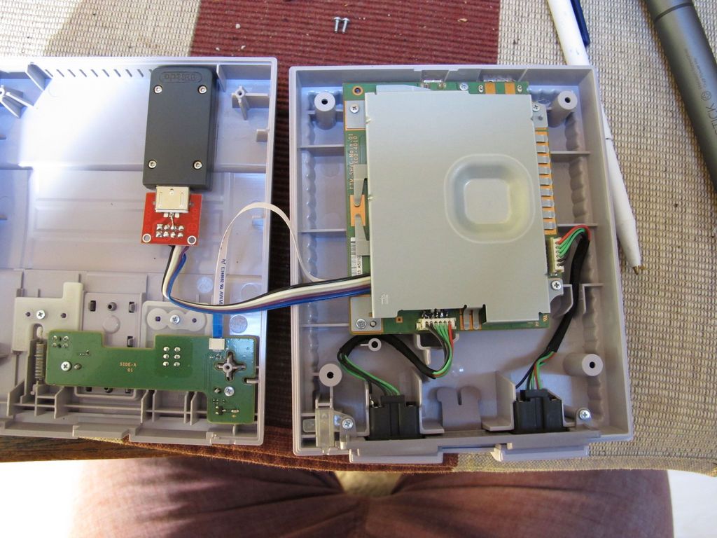 Secure Adapter to Interior of Console, Put Console Back Together. Play Games! :)