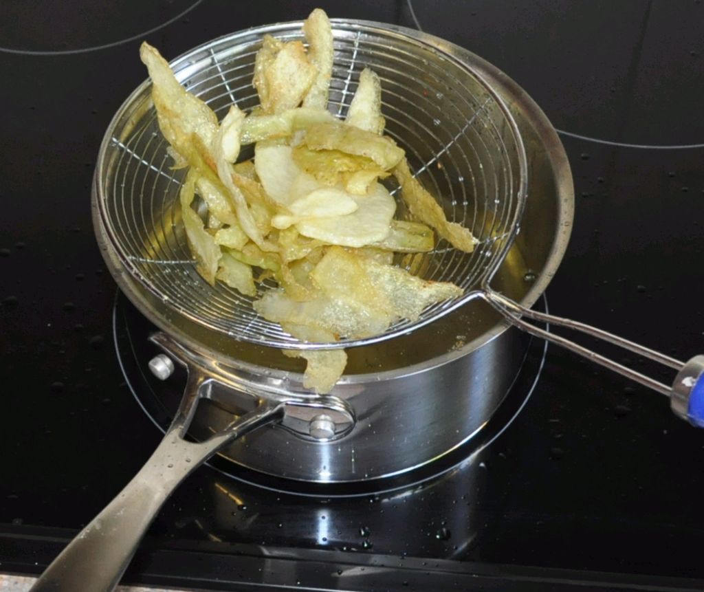 Frying Potato Skins and Bananas for Snacks