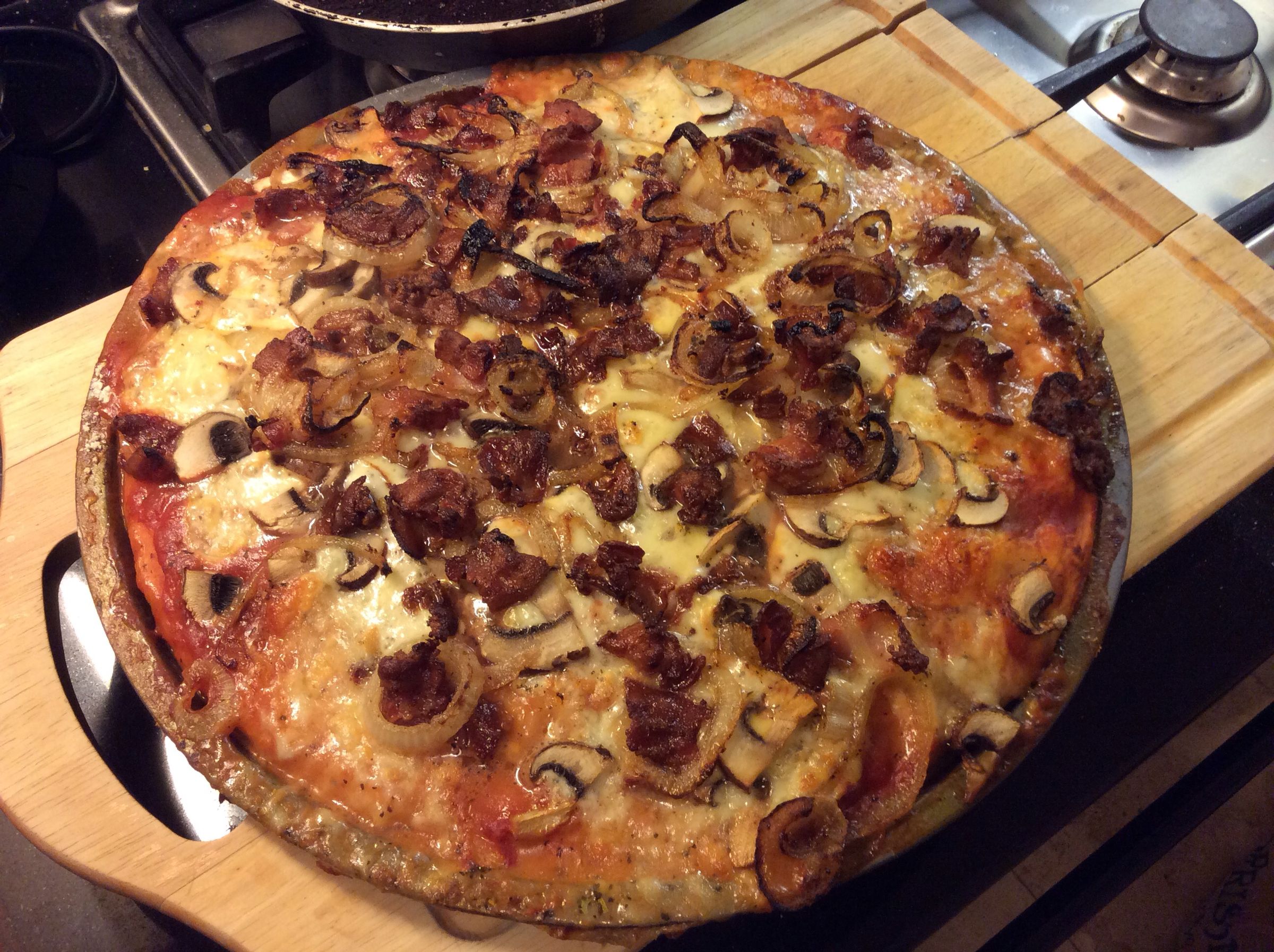 Home Made Pizza with Bacon, Mushroom and Onion