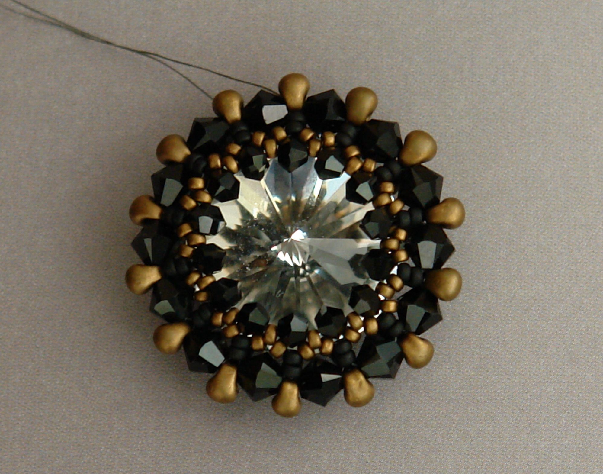 Sidonia's Handmade Jewelry - How to Bezel an 18mm Swarovski Rivoli