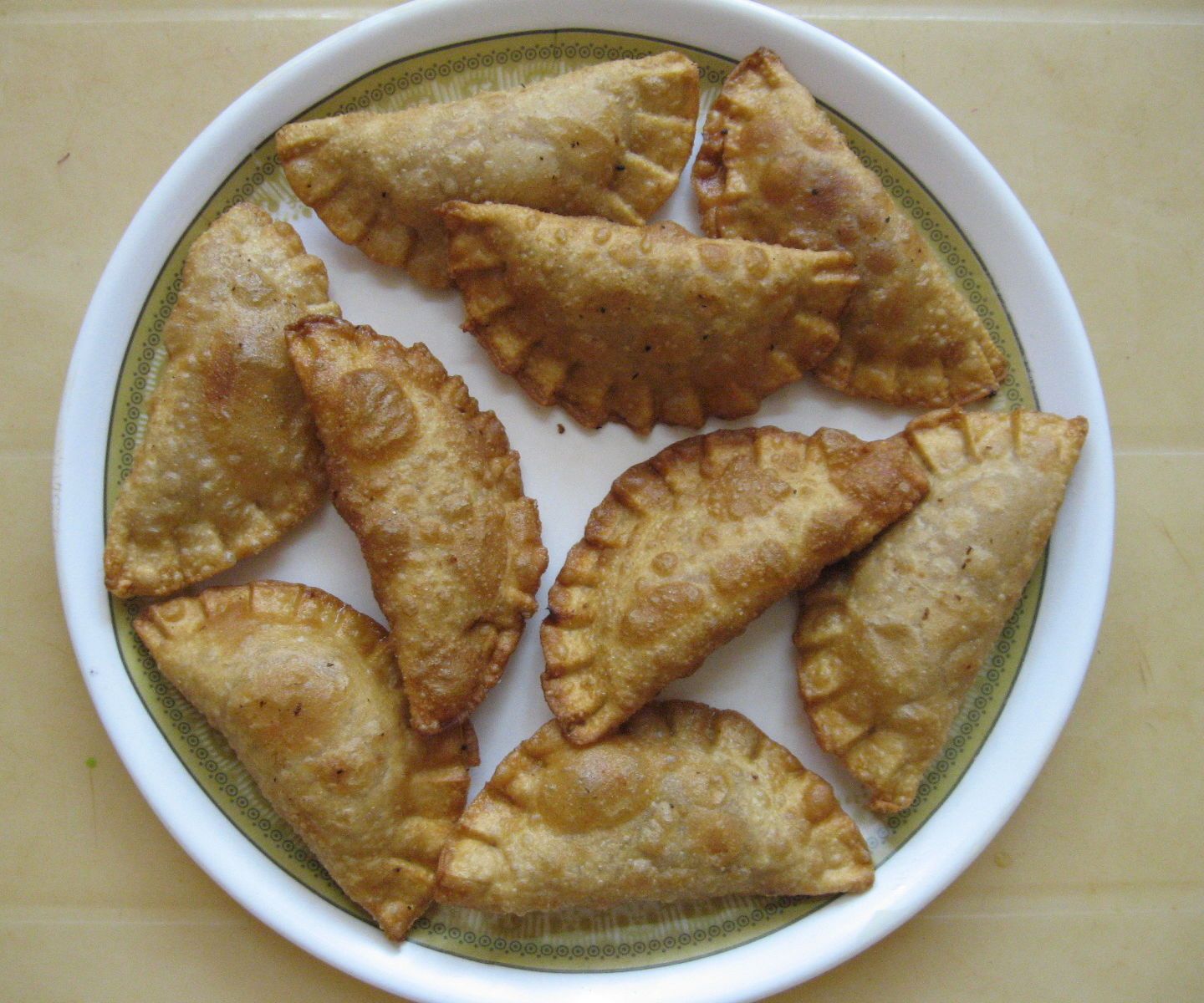 Coconut - Jaggery Stuffed Dough Press Sweet