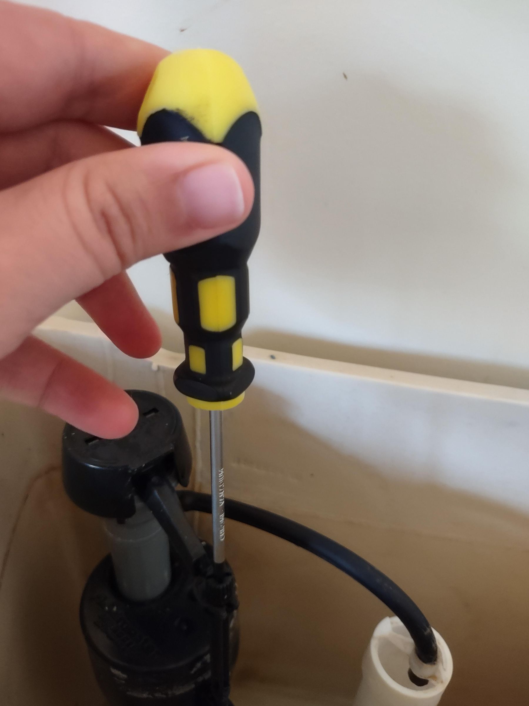 Fix a Toilet Tank Loose Handle, Discolored Water, and High Water Level