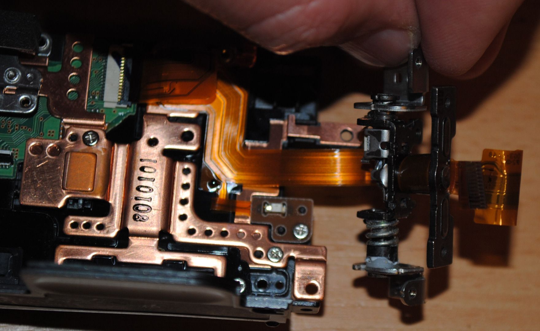 How to Replace the LCD Flex Cable for Canon HF11 Camcorder 4 Steps