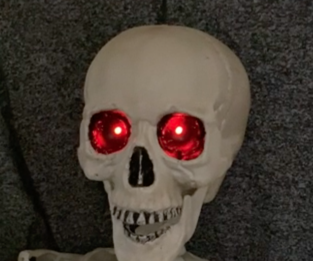 Skeleton With Dimming Red Eyes