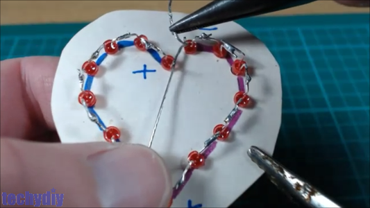 Solder a Flexible Wire to Join the Leds at the Top of the Heart