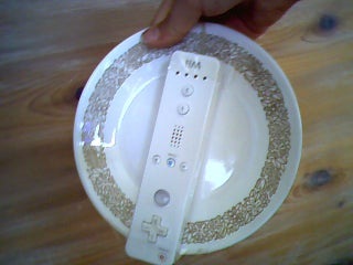 Tape the Wii Remote Onto the Front of the Plate and Ta Daa!