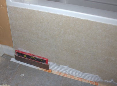 Measure, Cut, and Apply Backerboard.