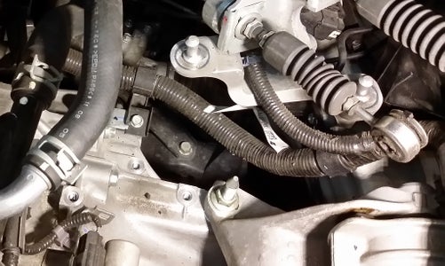 Disconnect the Shifter, Sensors, and Harness From Transmission
