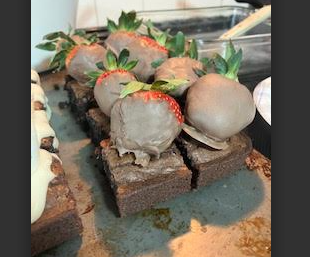 Chocolate-Covered Strawberries and Melting Marshmallow Snowmen on 16 Fudge Brownies