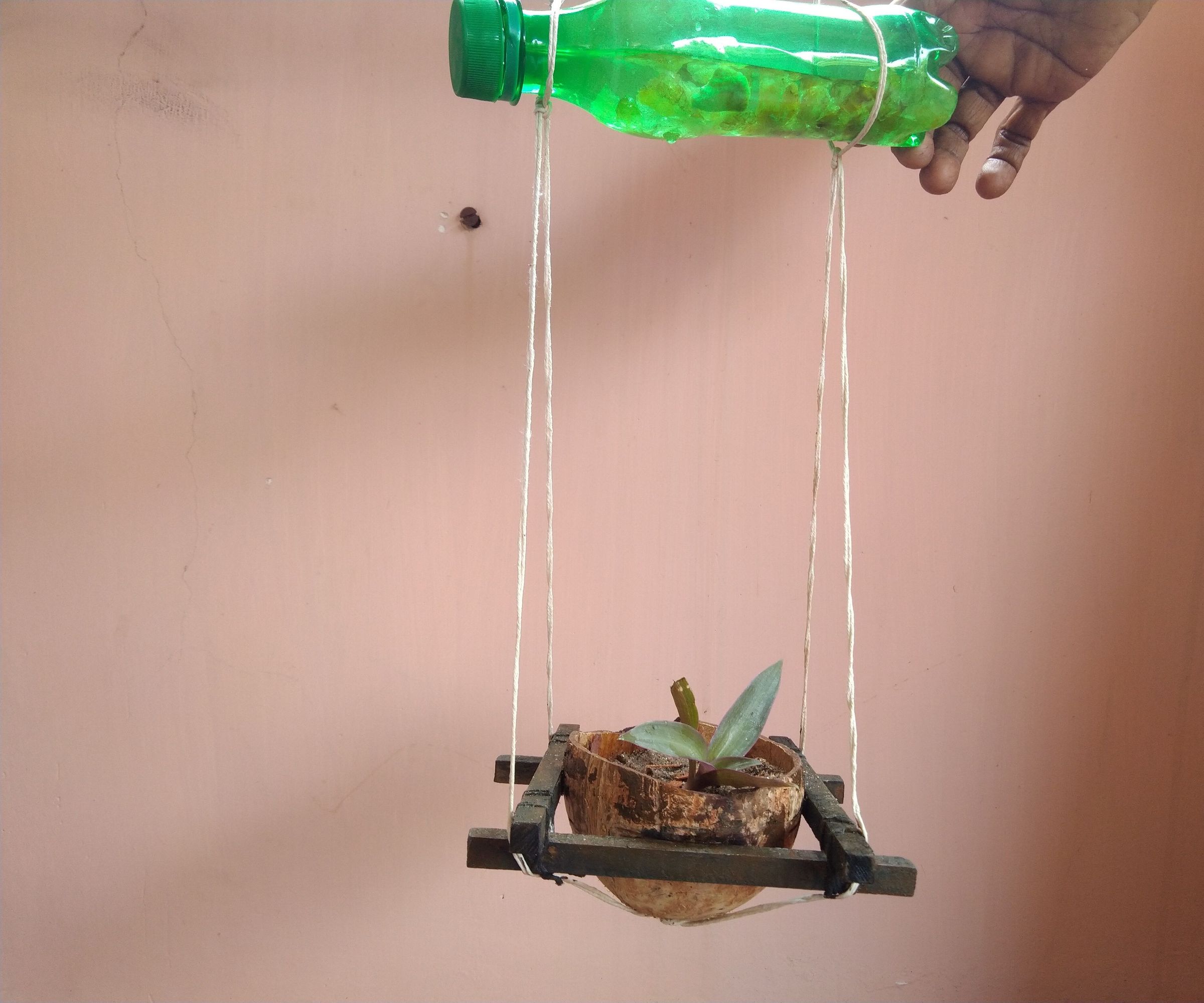 Coconut Shell Hanging Planter With Water Supply