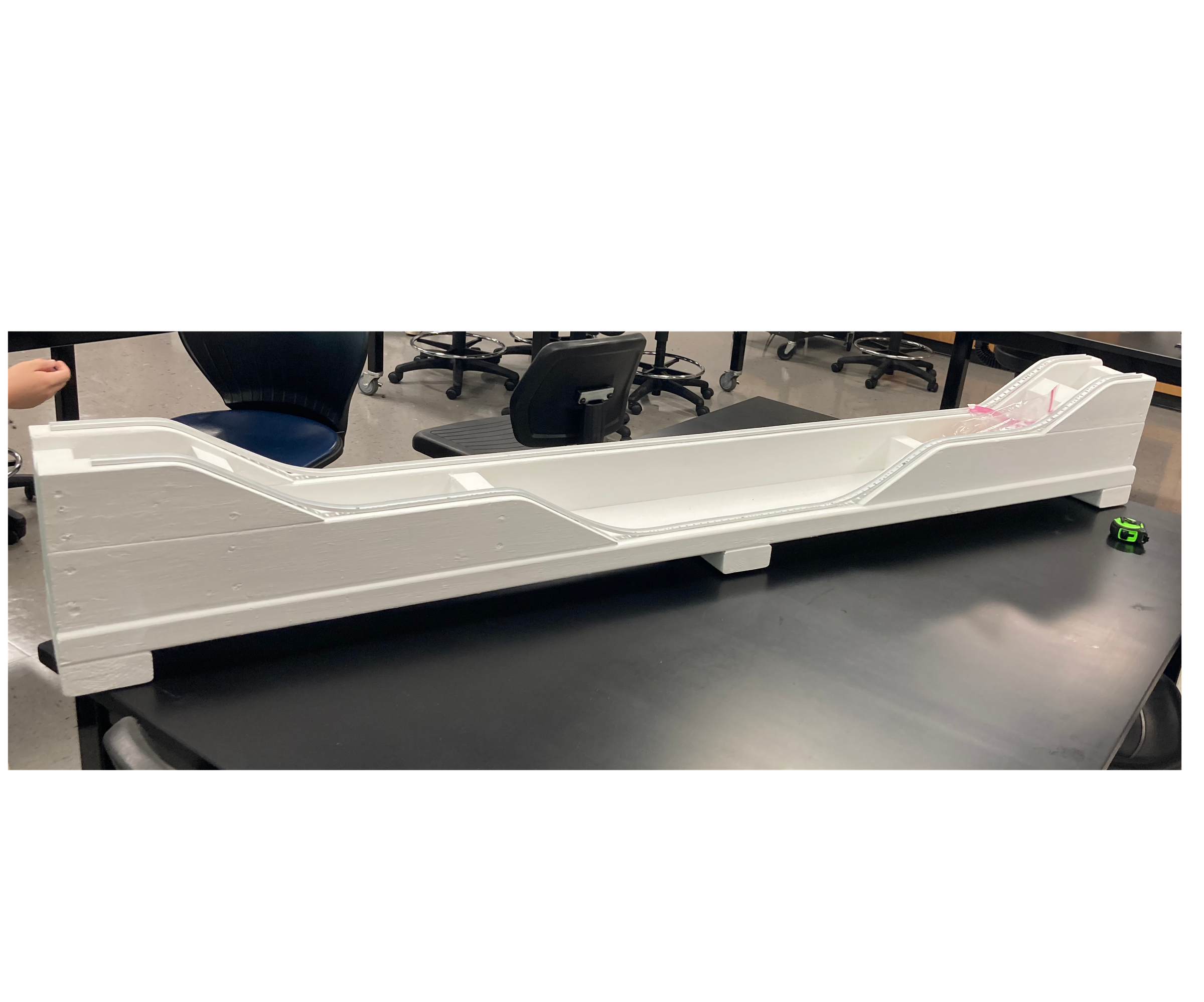 The Race of Two Balls (Physics Experiment for the Classroom)