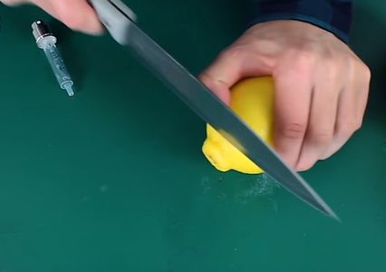 Insert the Syringe Into the Lemon and the Lemon Spray Is Ready for Spraying On. 