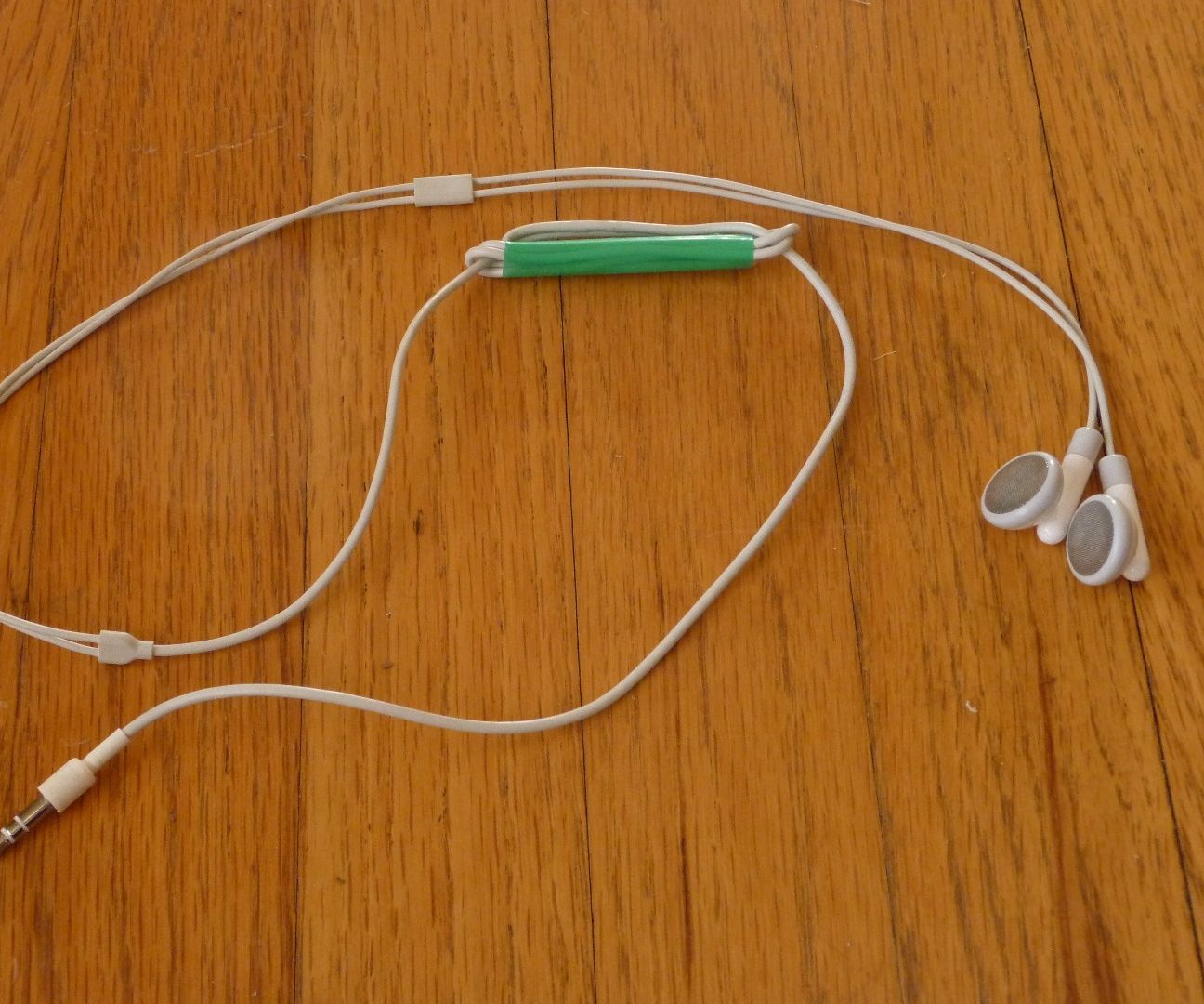 A Simple, Lighter, Cord Manager for Your Earbuds