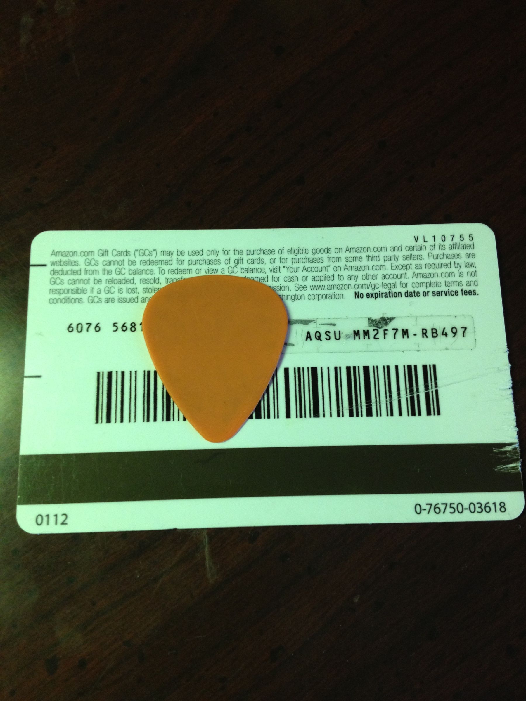 How to Make a Guitar Pick Out of an Old Gift Card/ Credit Card 5