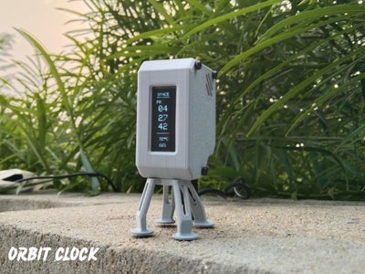 OrbitClock – a Tiny Space-Inspired IoT Environment Clock