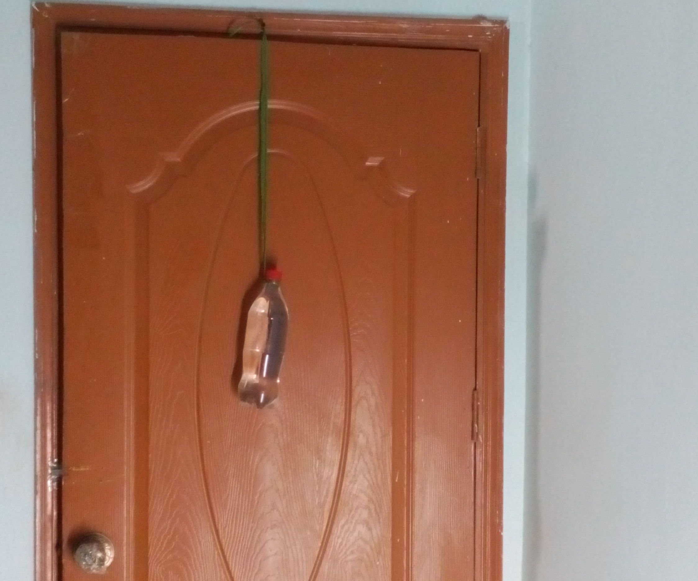 Automatic Diy Door Closer With a Bottle