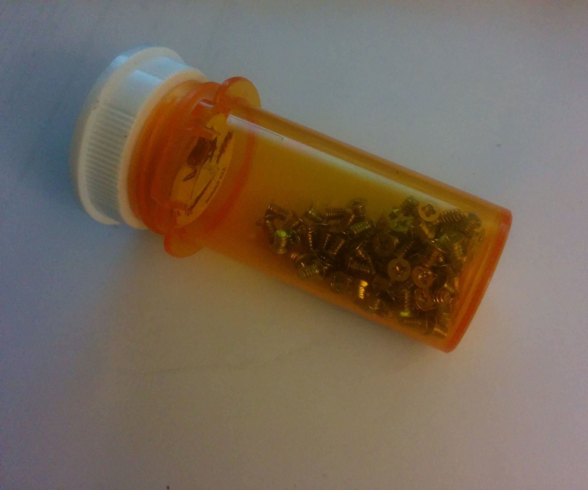 Recycled Pill Bottle Screw Catcher. X-top-cap