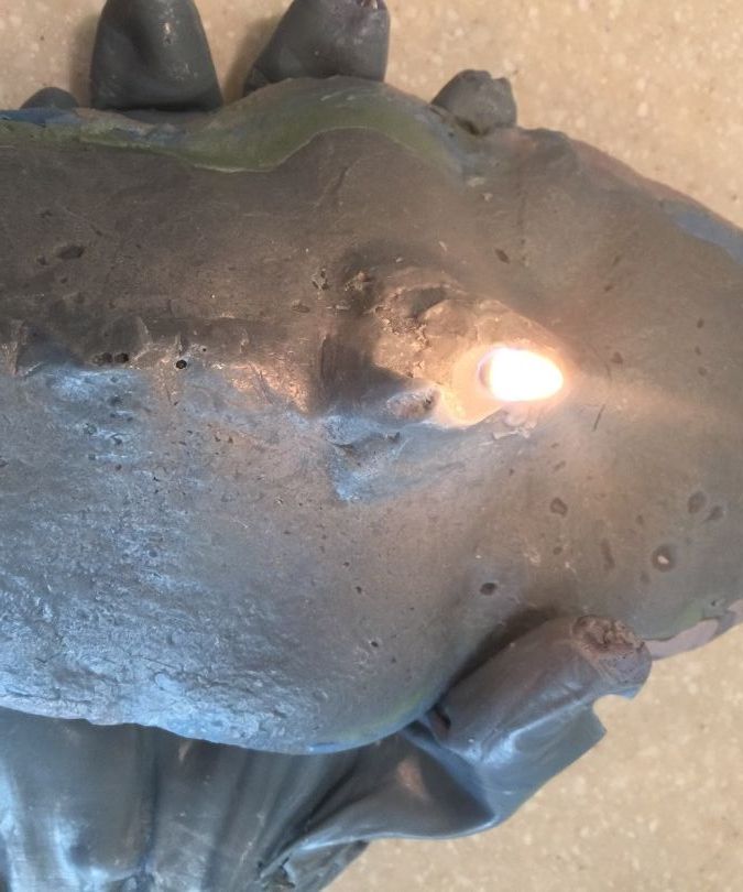 Wax Face in Hand Candle