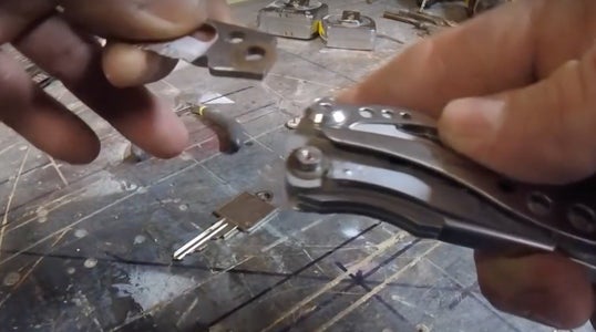 SELECT THE LEATHERMAN AND KEY