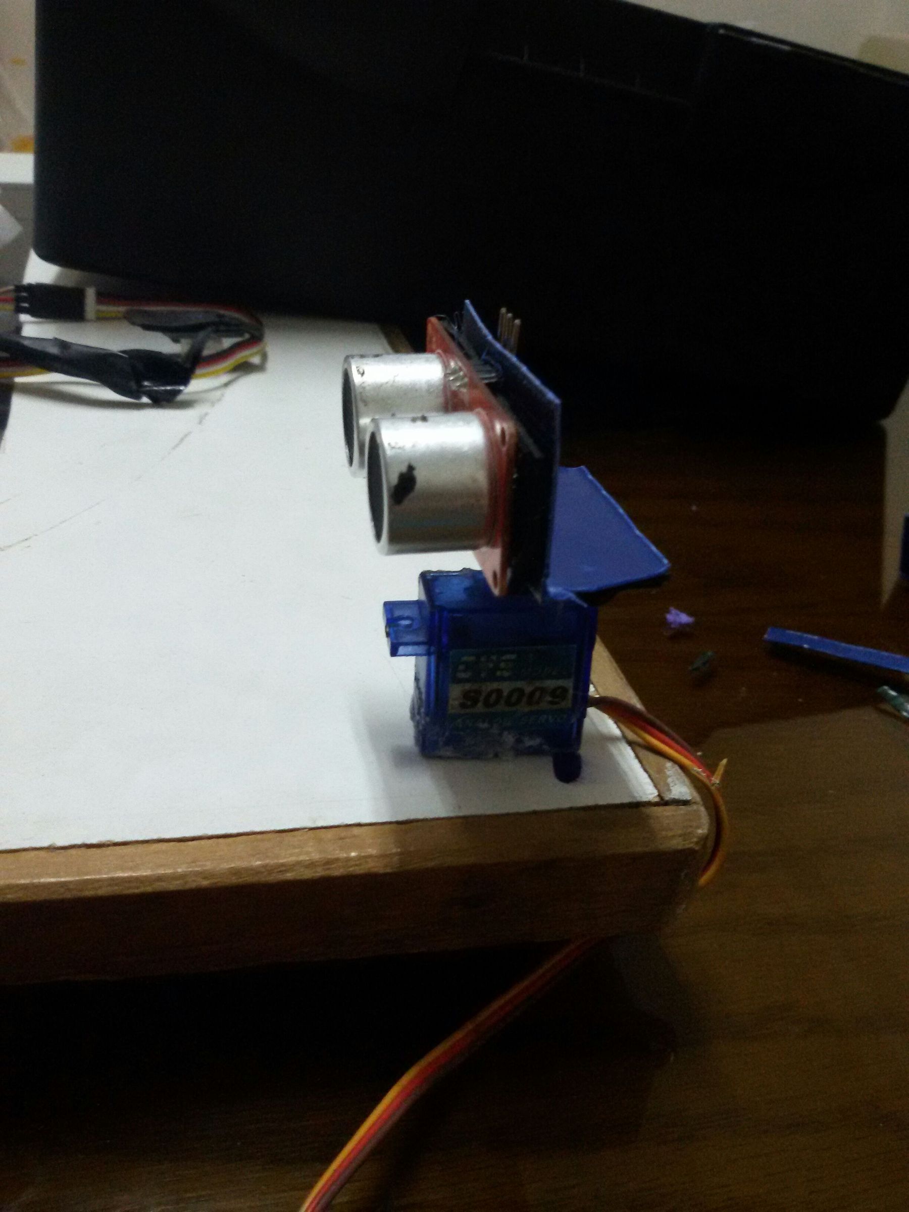 How to attach ultrasonic to servo motor :