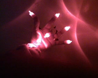 Finger Lights for Night Time Communication for the Deaf.