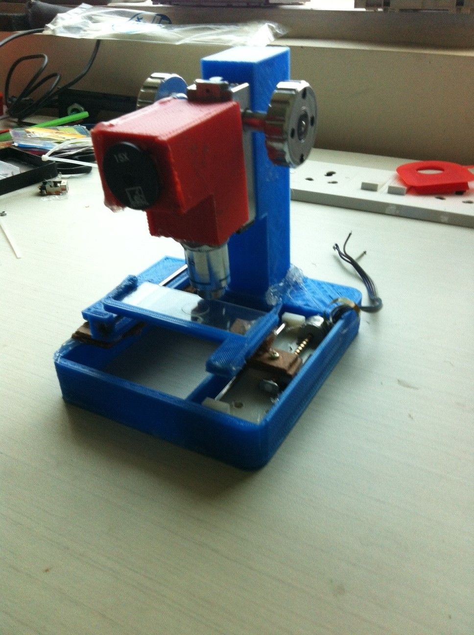 Low Cost Digital Microscope With Automated Slide Movement