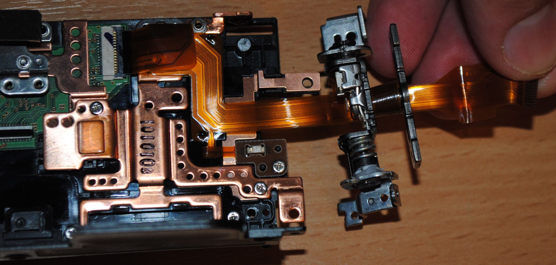 How to Replace the LCD Flex Cable for Canon HF11 Camcorder 4 Steps