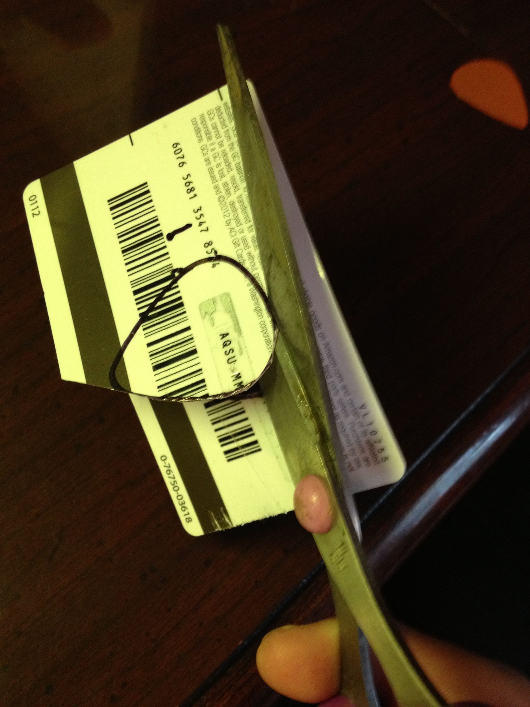 How to Make a Guitar Pick Out of an Old Gift Card/ Credit Card 5