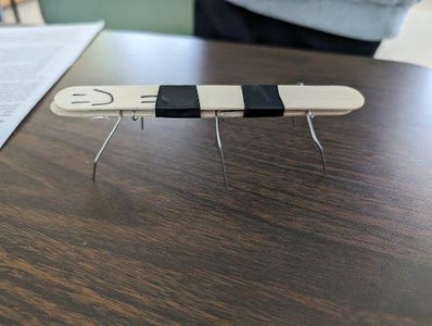 Secure Legs Between Two Craft Sticks