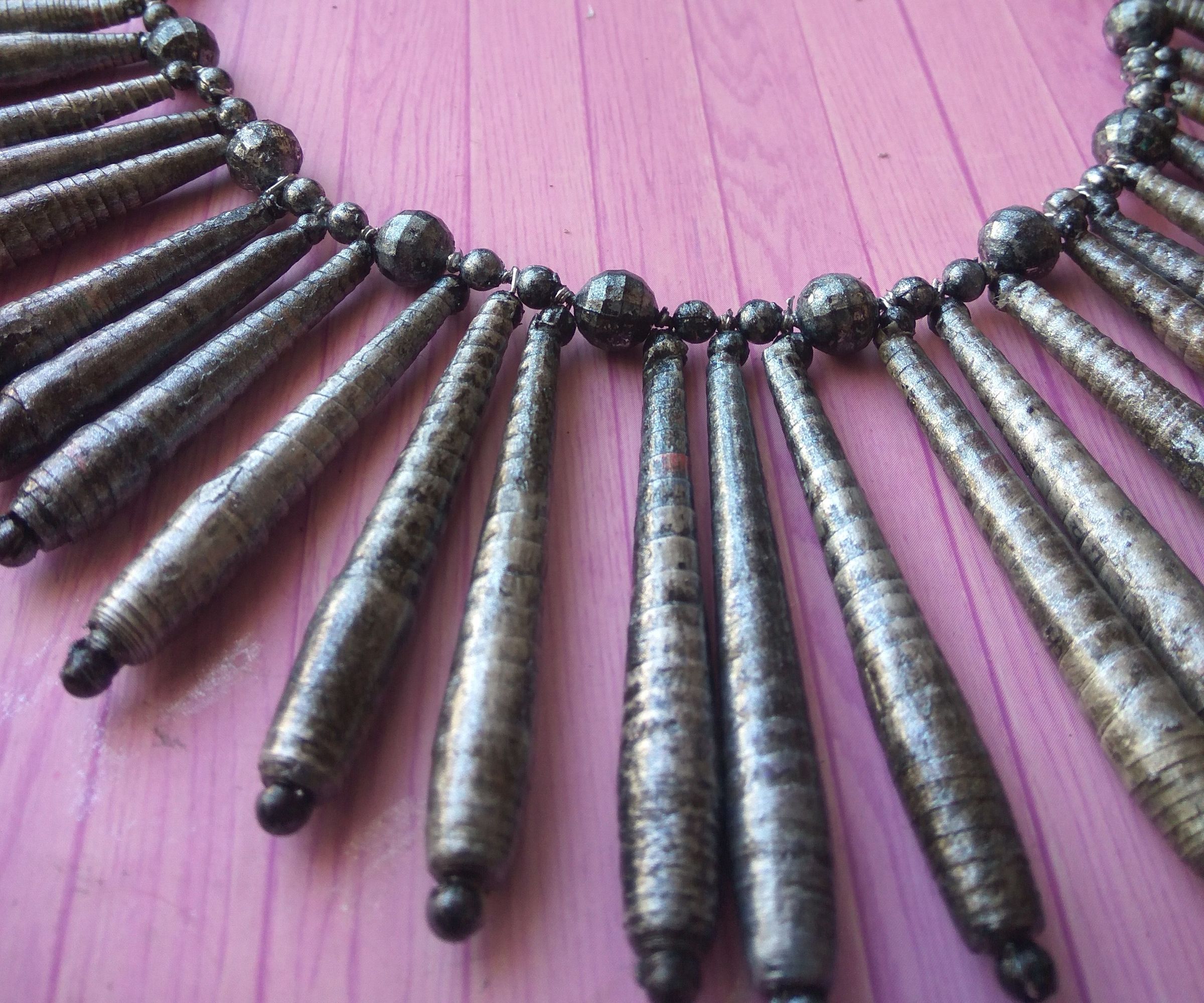 Treasured neckpiece as a valentine gift from trash magazine paper