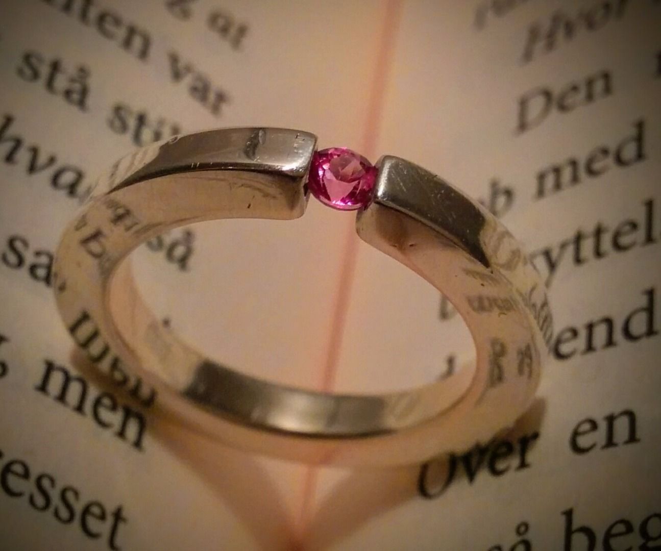 Simple Silver Ring With Tension Set Gemstone