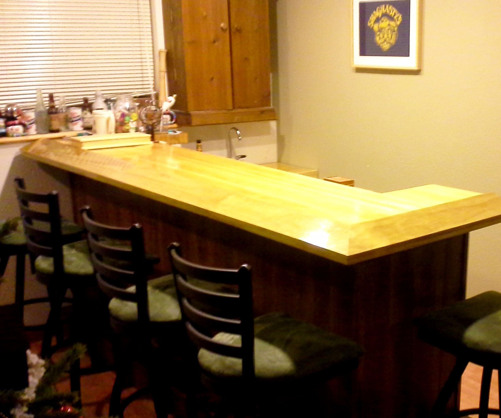 Home bar with reclaimed bowling alley bar top