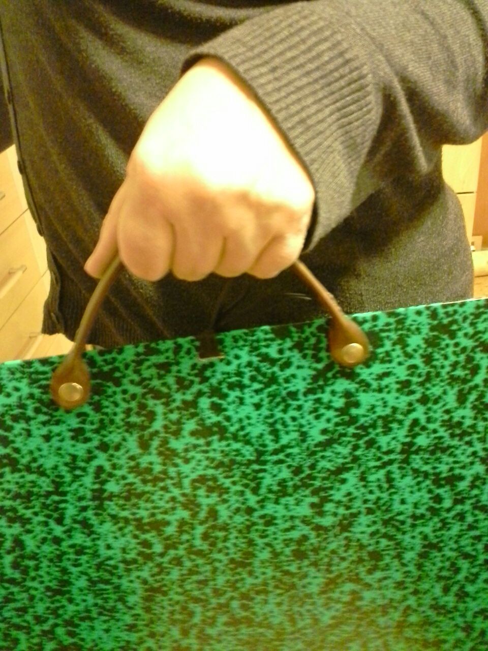 How to make a leather handle for a cardboard art portfolio..