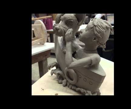 Figurative ceramic sculpture of dog and girl by artsy soul, Edrian Thomidis 
