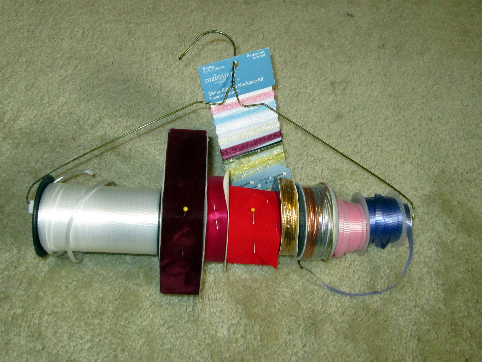 Ribbon and tape holder from dry cleaning hanger