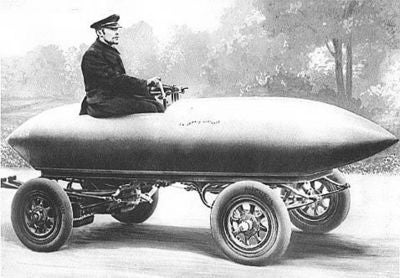An Electric Trike With a Leaning Wooden Frame