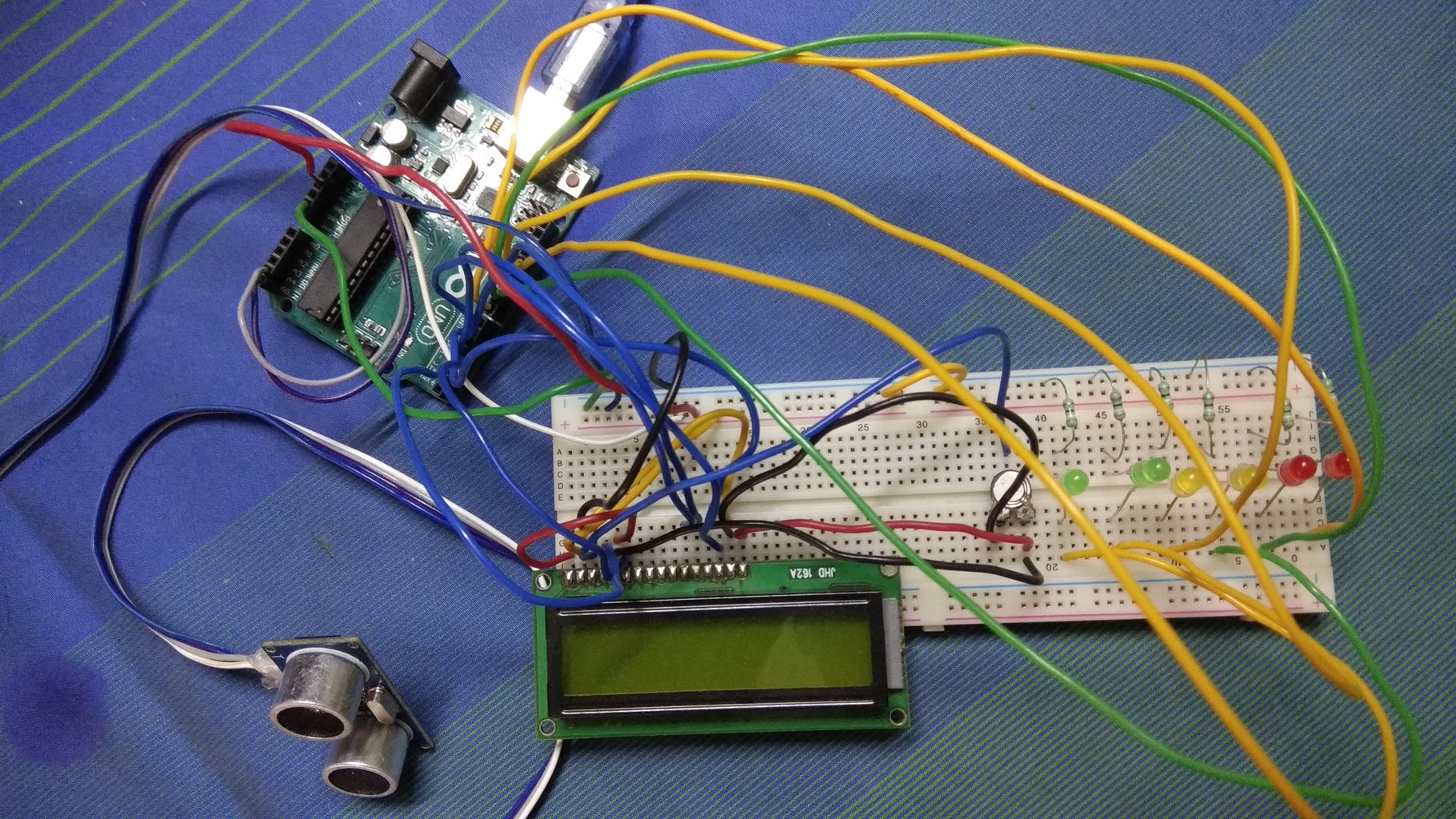 AUTOMATIC WATER TANK LEVEL INDICATOR & MOTOR CONTROL USING ULTRASONIC ...