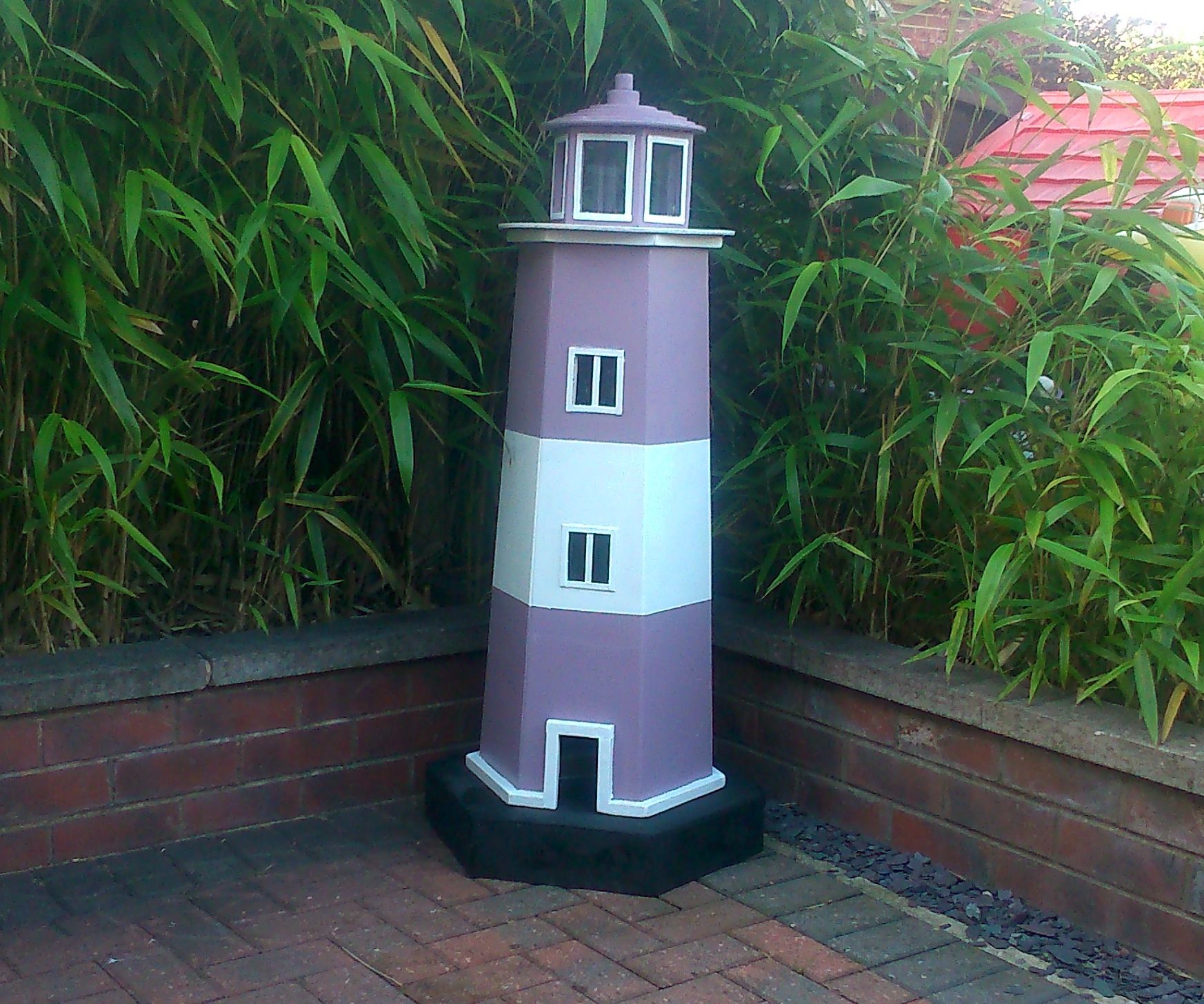 How to Build a Garden Lighthouse Out of Pallets
