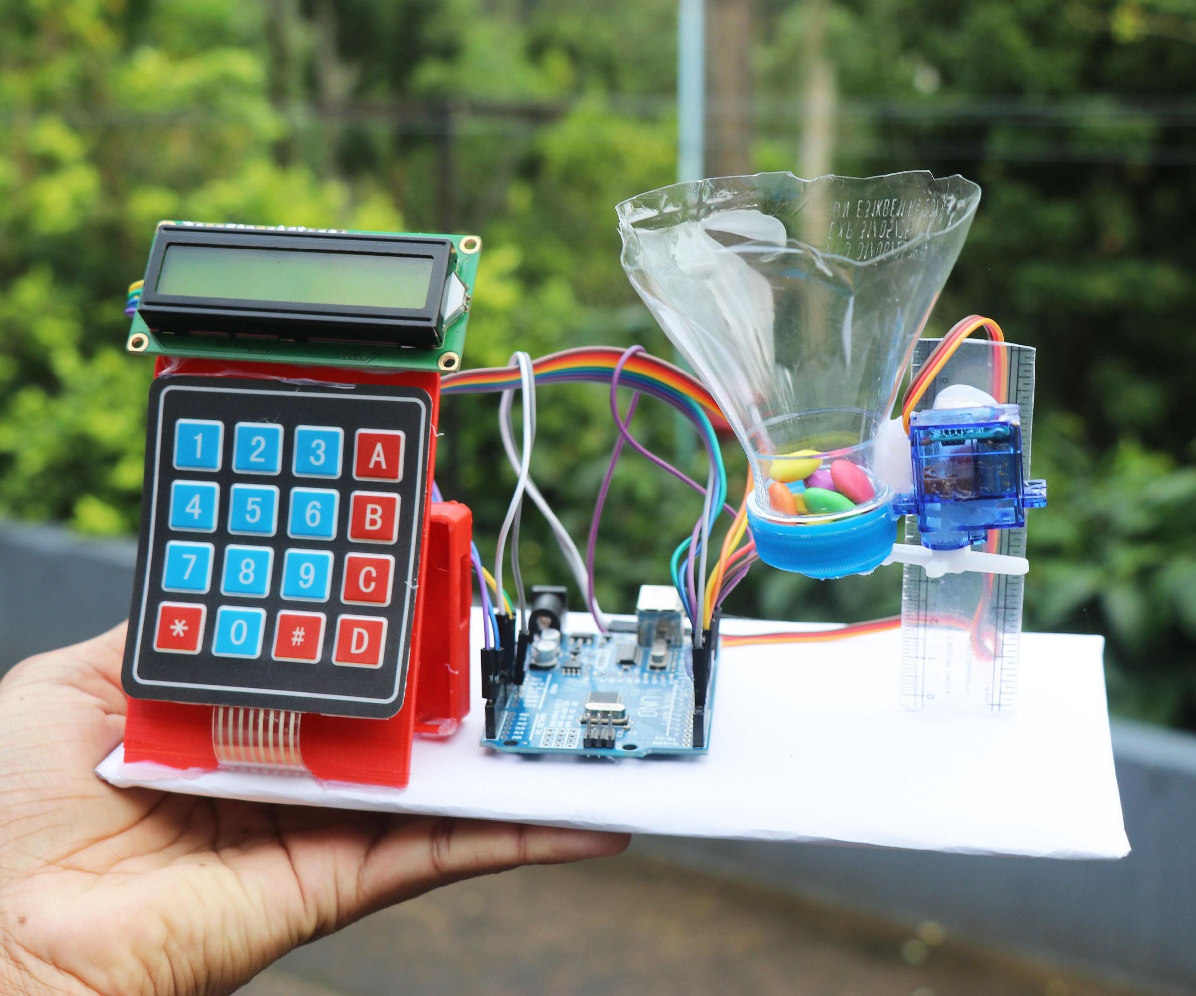 Candy Dispenser With Password Lock Powered by Arduino