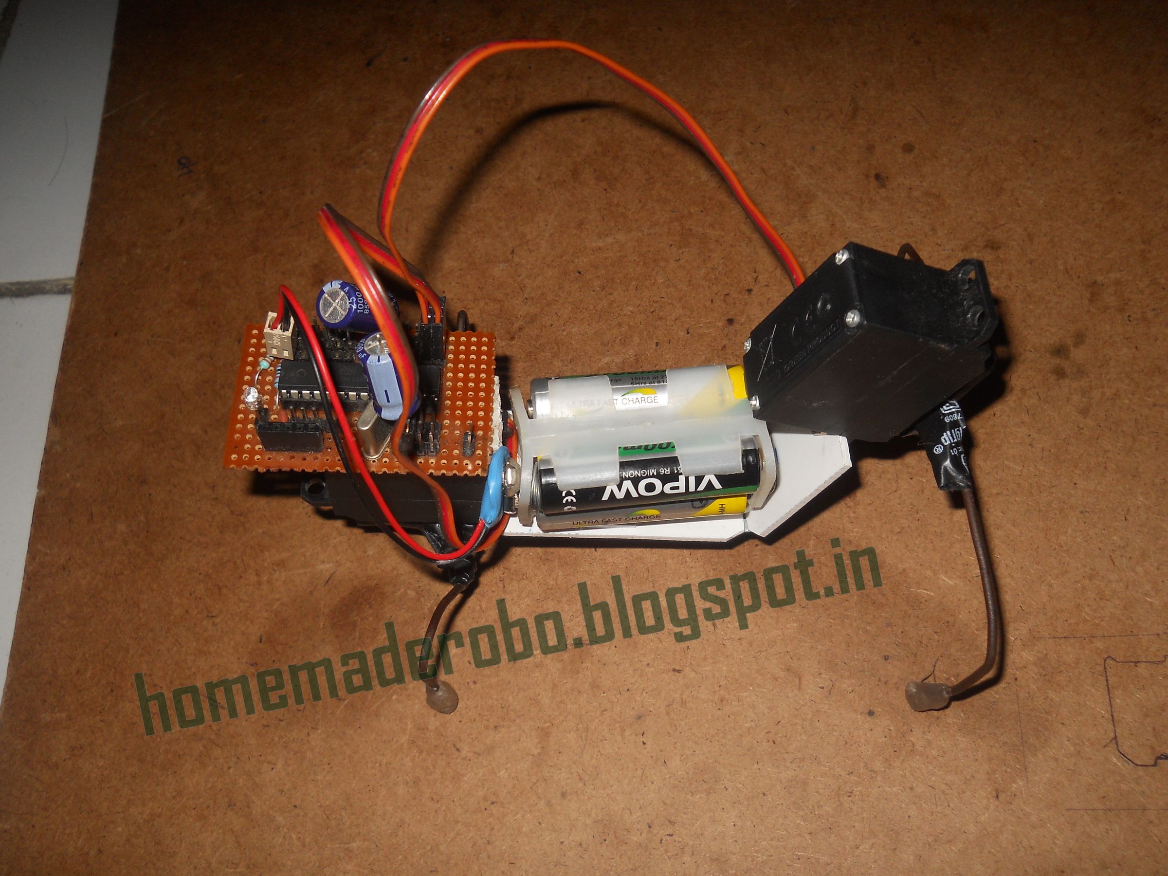 Quadruped robot using 2 servos with home made arduino