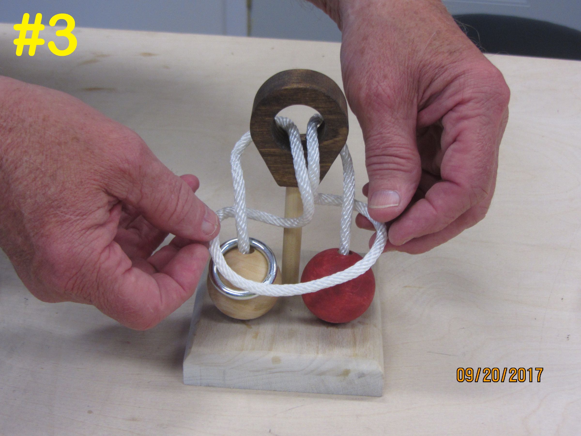 Wood Ball Metal Ring Rope Puzzle 16 Steps (with Pictures