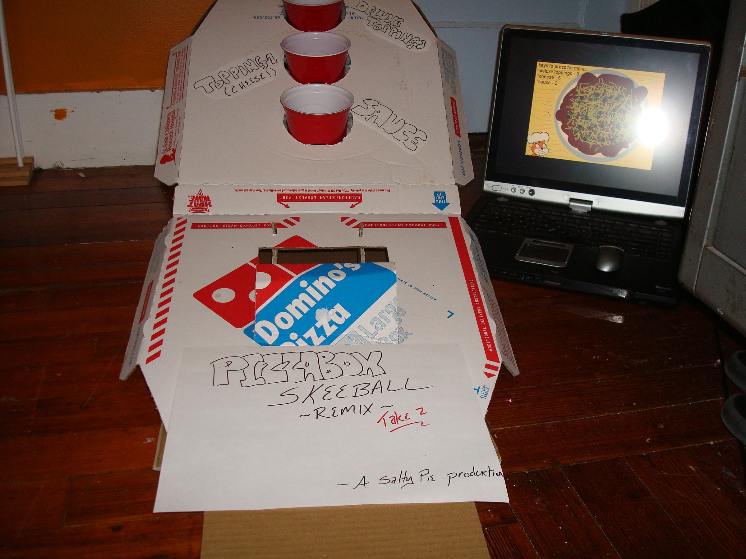 Make Skeeball-inspired Games Using Pizza Boxes, Party Favors, and a PC