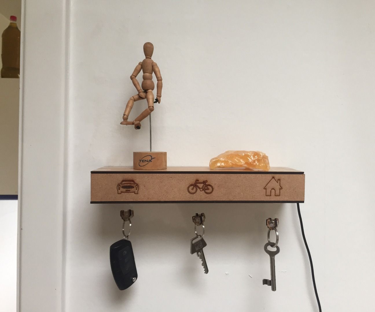 Levitating key-holder shelf