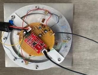 Making an Infrasonic Microbarometer to Listen to Ocean Sounds From Miles Away