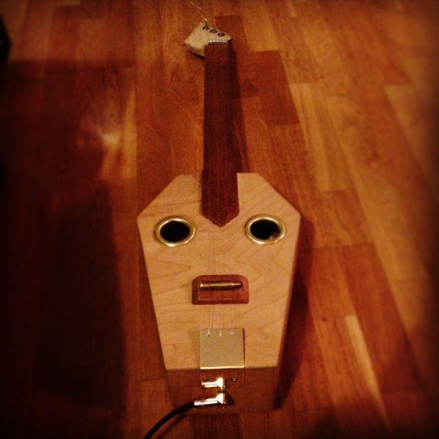 electro acoustic coffin slide guitar