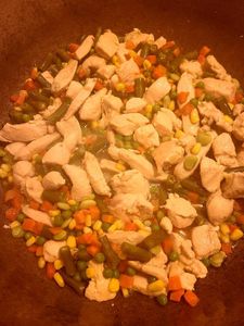 Adding the Veggie's and Cream of Chicken Cans 